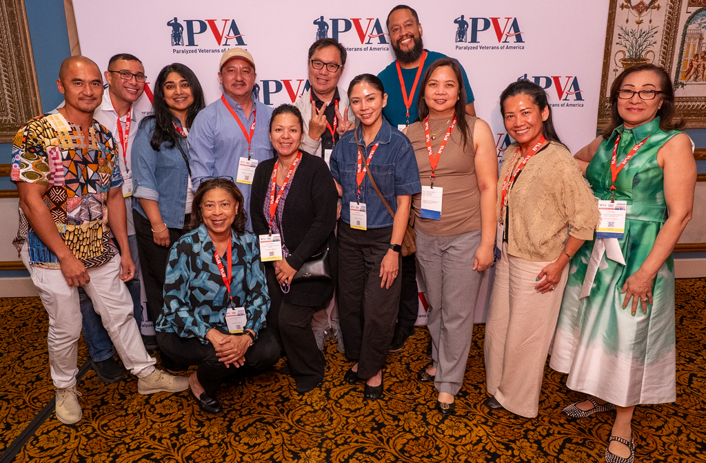 A group of attendees pose for a photo during a networking session at a recent Summit meeting.